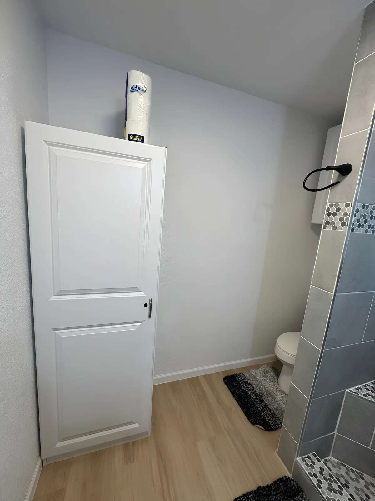 Bathroom reconstruction with new framing and surfaces